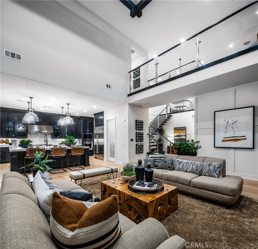 27534 Elderberry Drive Valencia, CA 91381 - Photo 5 of 17 a living room with furniture and a view of kitchen