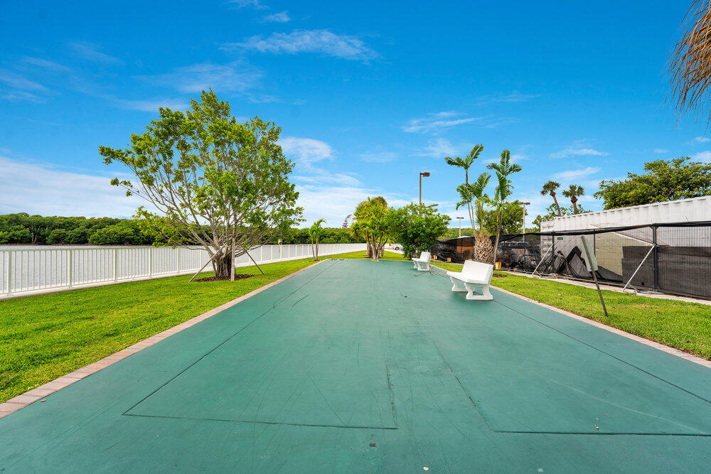 500 Bayview Drive, Unit 1521 Sunny Isles Beach, FL 33160 - Photo 21 of 31 a view of yard with swimming pool and green space