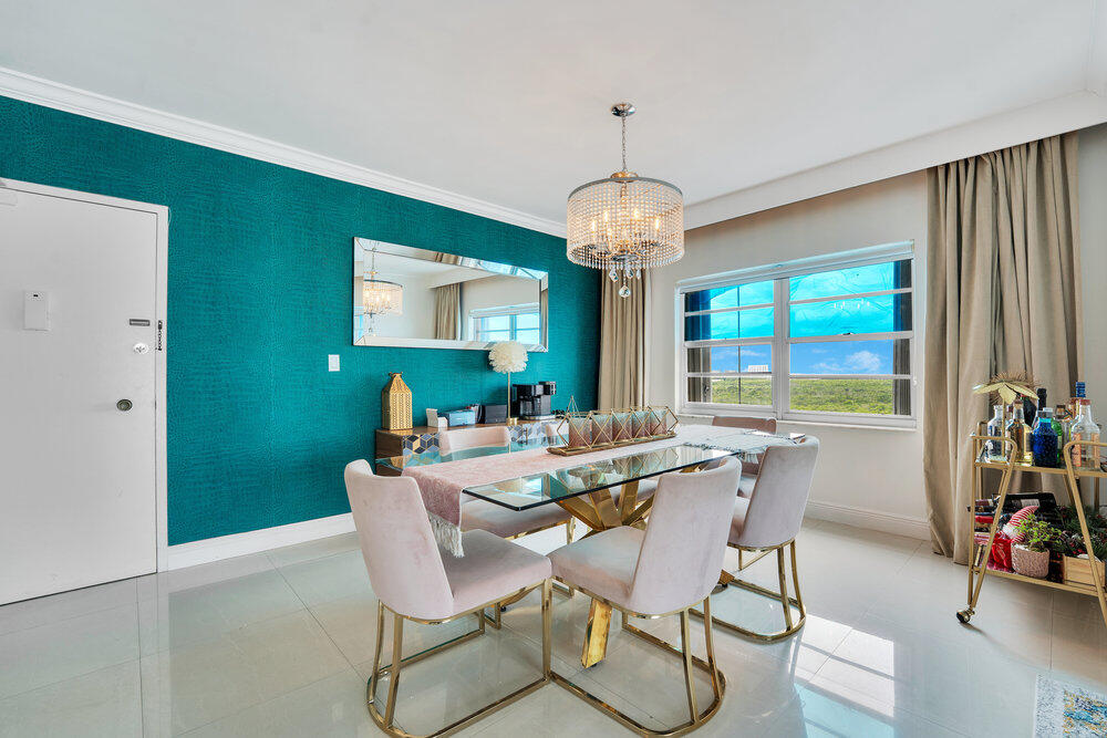 500 Bayview Drive, Unit 1521 Sunny Isles Beach, FL 33160 - Photo 5 of 31 a view of a dining room with furniture window and outside view