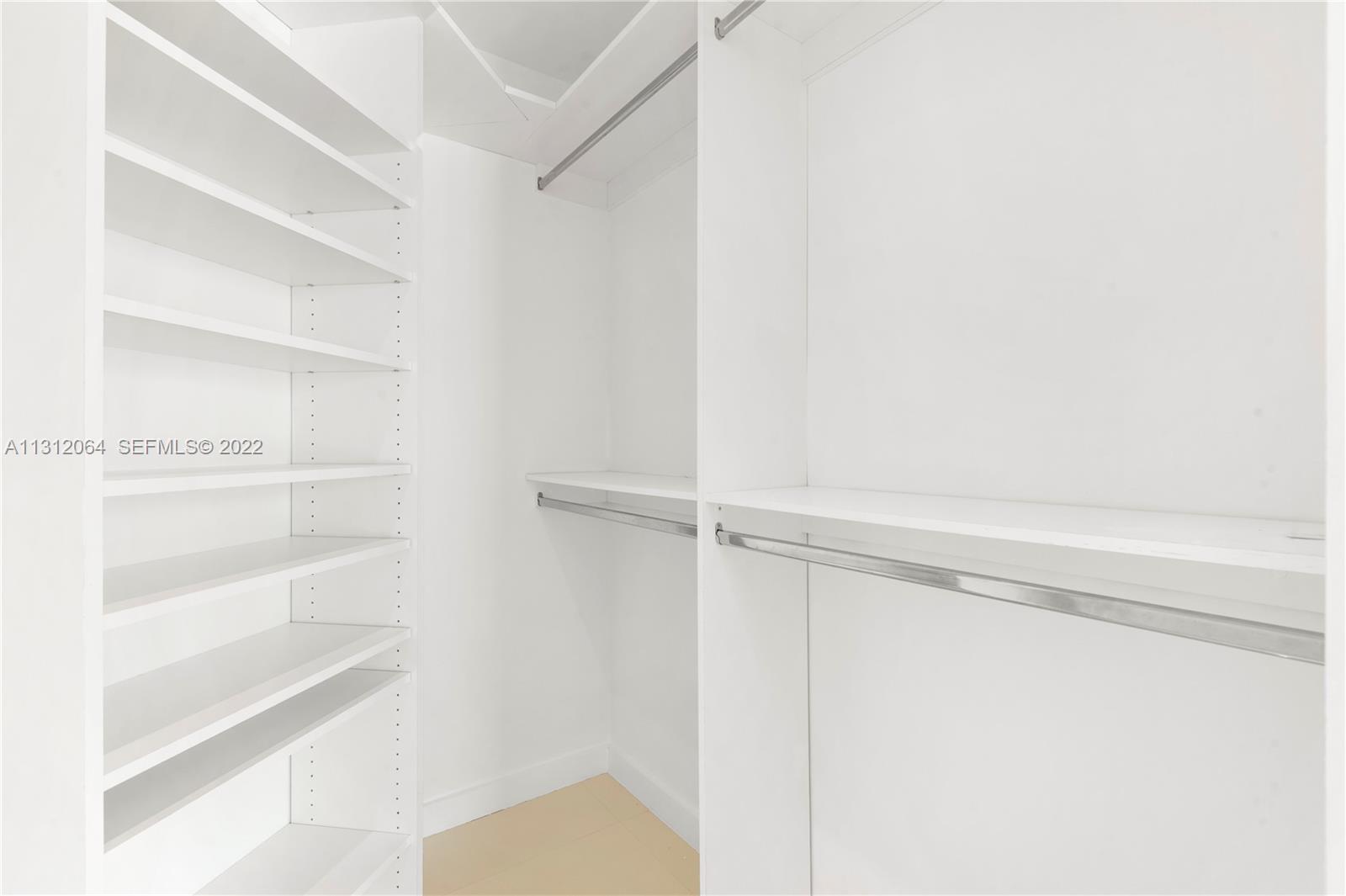 1010 Southwest 2nd Avenue, Unit 2004 Miami, FL 33130 - Photo 11 of 19 a view of an empty walk in closet
