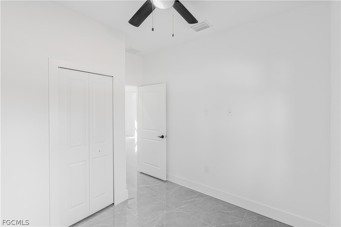 745 Roma Avenue South Lehigh Acres, FL 33974 - Photo 24 of 40 a view of ceiling fan