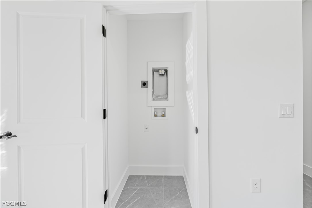 745 Roma Avenue South Lehigh Acres, FL 33974 - Photo 33 of 40 a view of a hallway