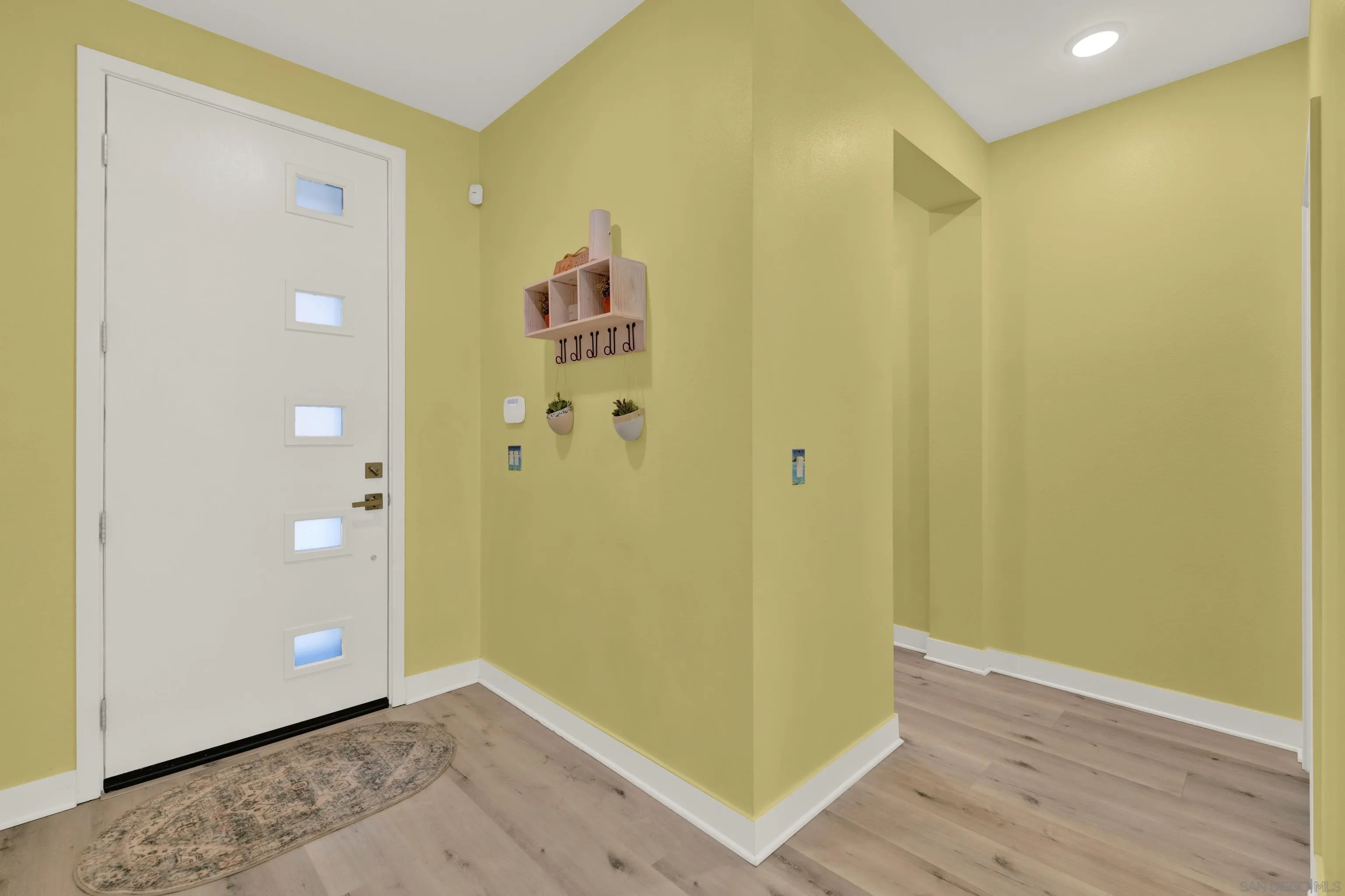 9108 West Bluff Place Santee, CA 92071 - Photo 14 of 72 a view of a big room with wooden floor