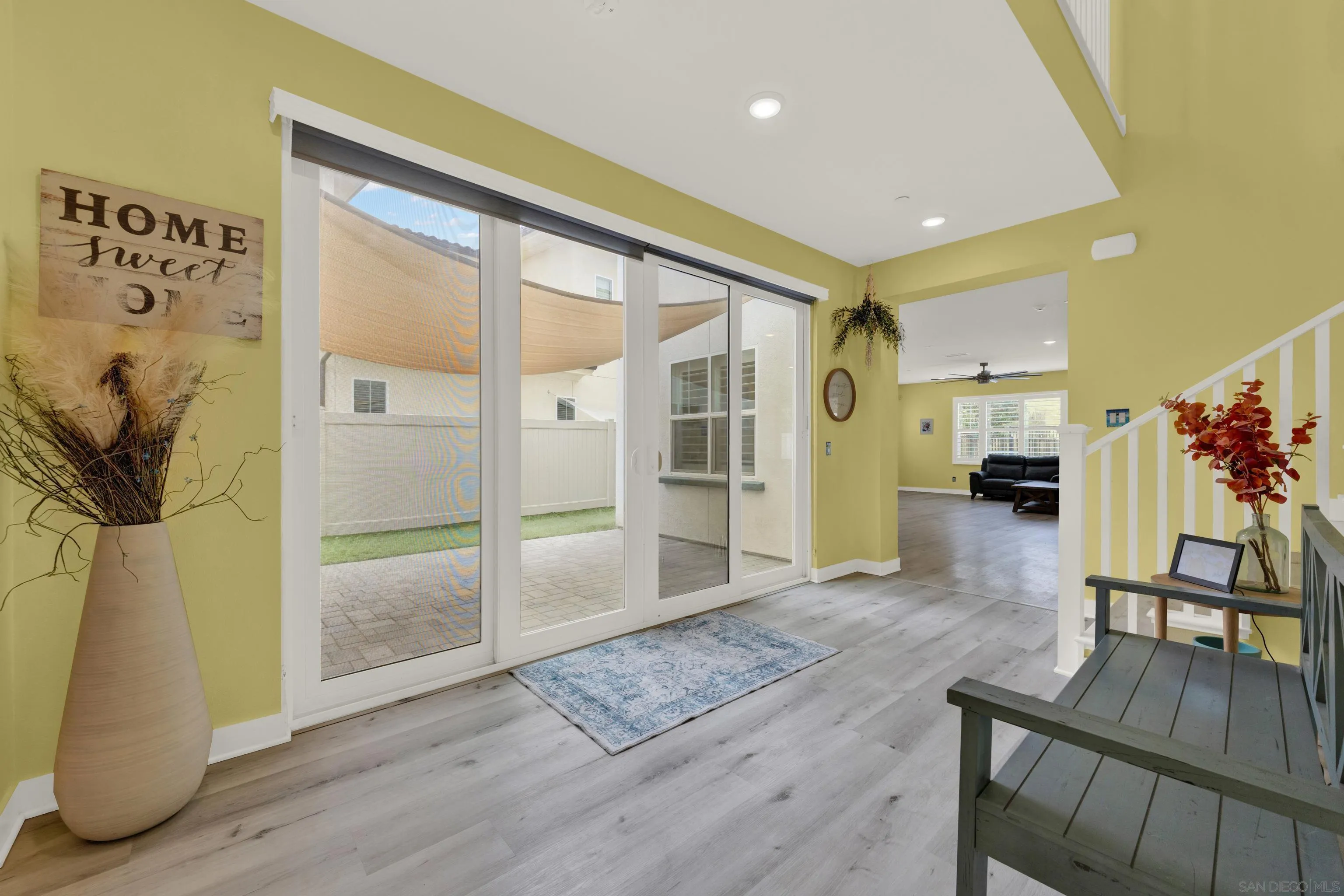 9108 West Bluff Place Santee, CA 92071 - Photo 23 of 72 a living room with furniture and a wooden floor