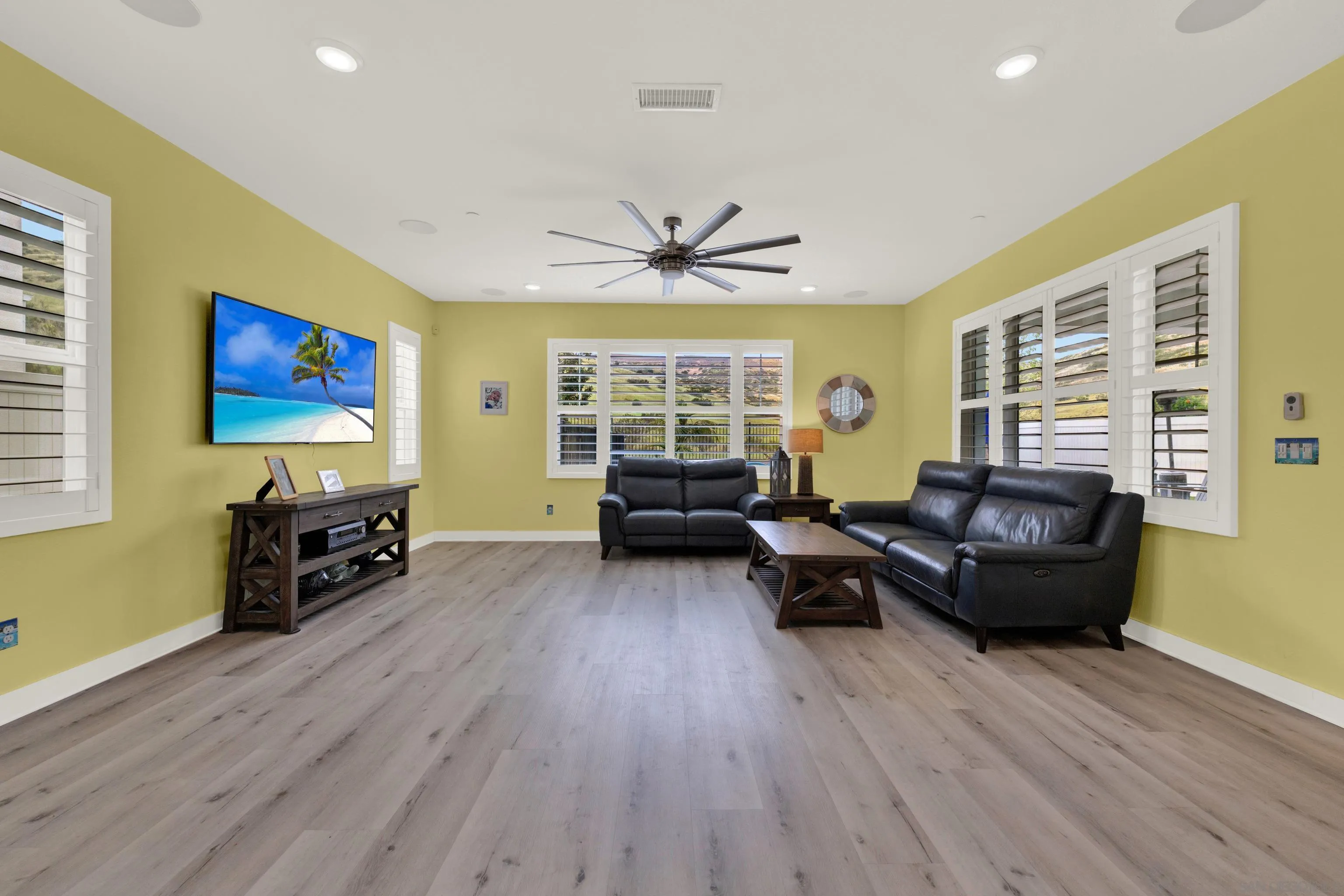 9108 West Bluff Place Santee, CA 92071 - Photo 29 of 72 a living room with furniture and wooden floor