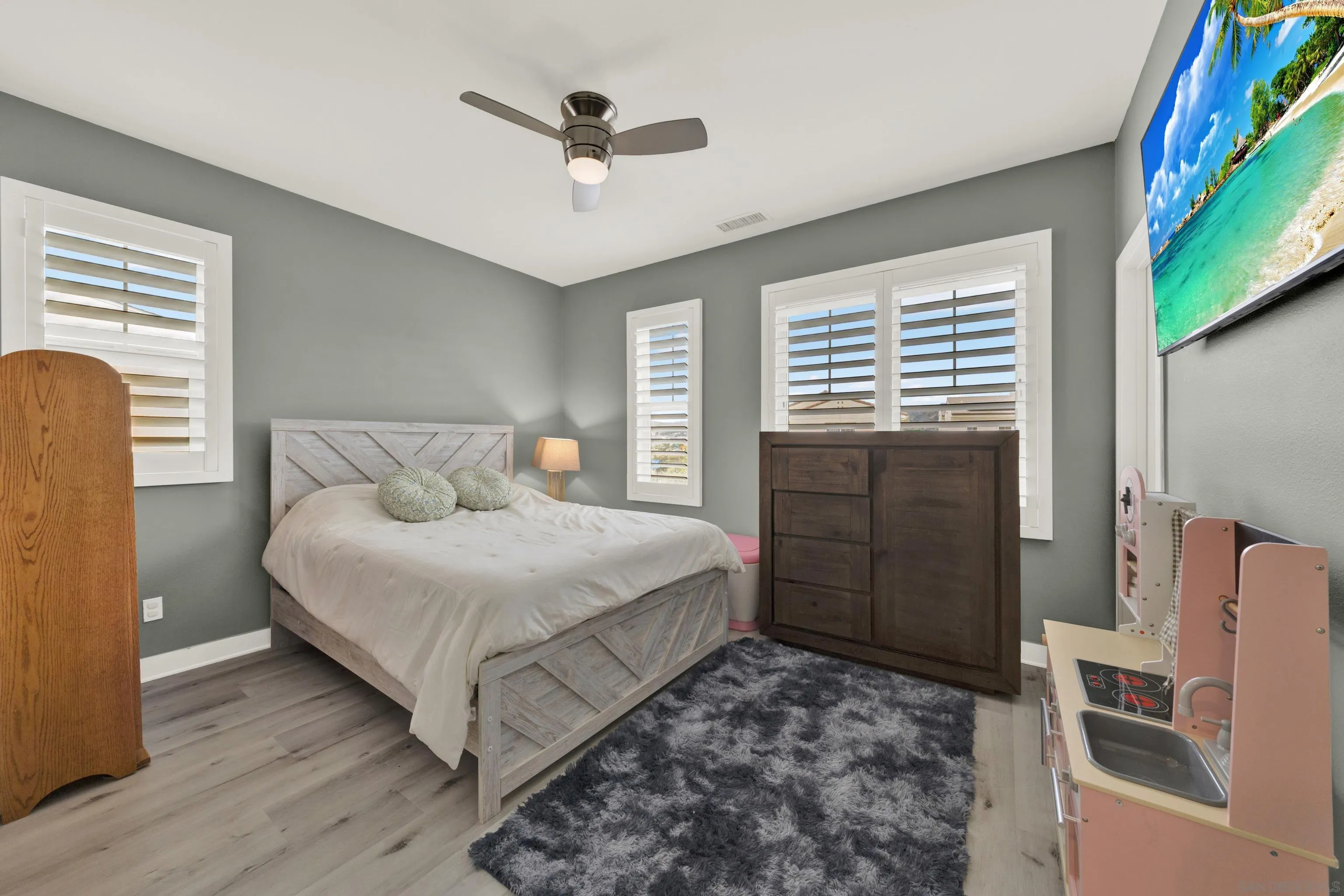 9108 West Bluff Place Santee, CA 92071 - Photo 53 of 72 a bedroom with a large bed and a window