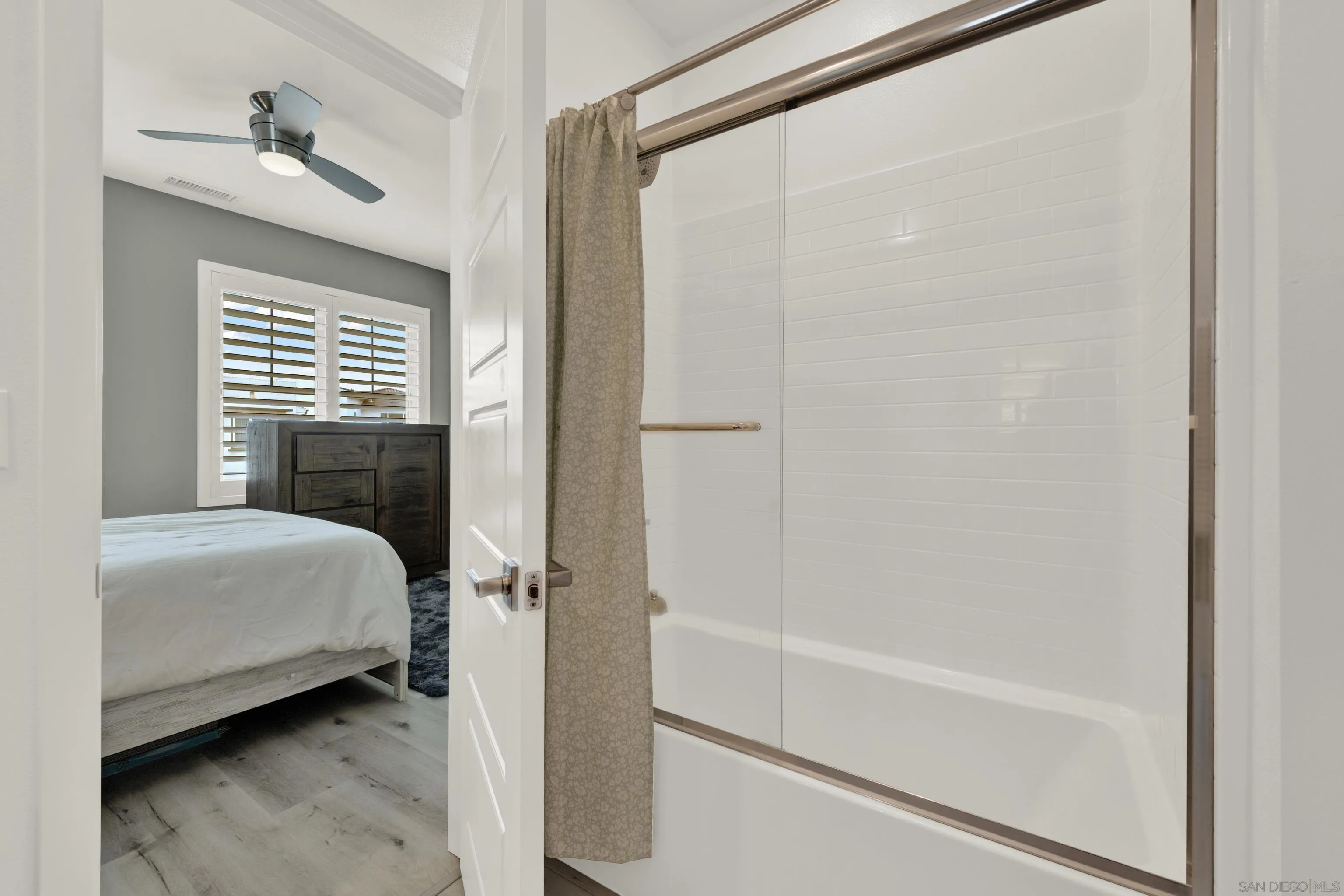 9108 West Bluff Place Santee, CA 92071 - Photo 56 of 72 a bathroom with a bathtub and a shower