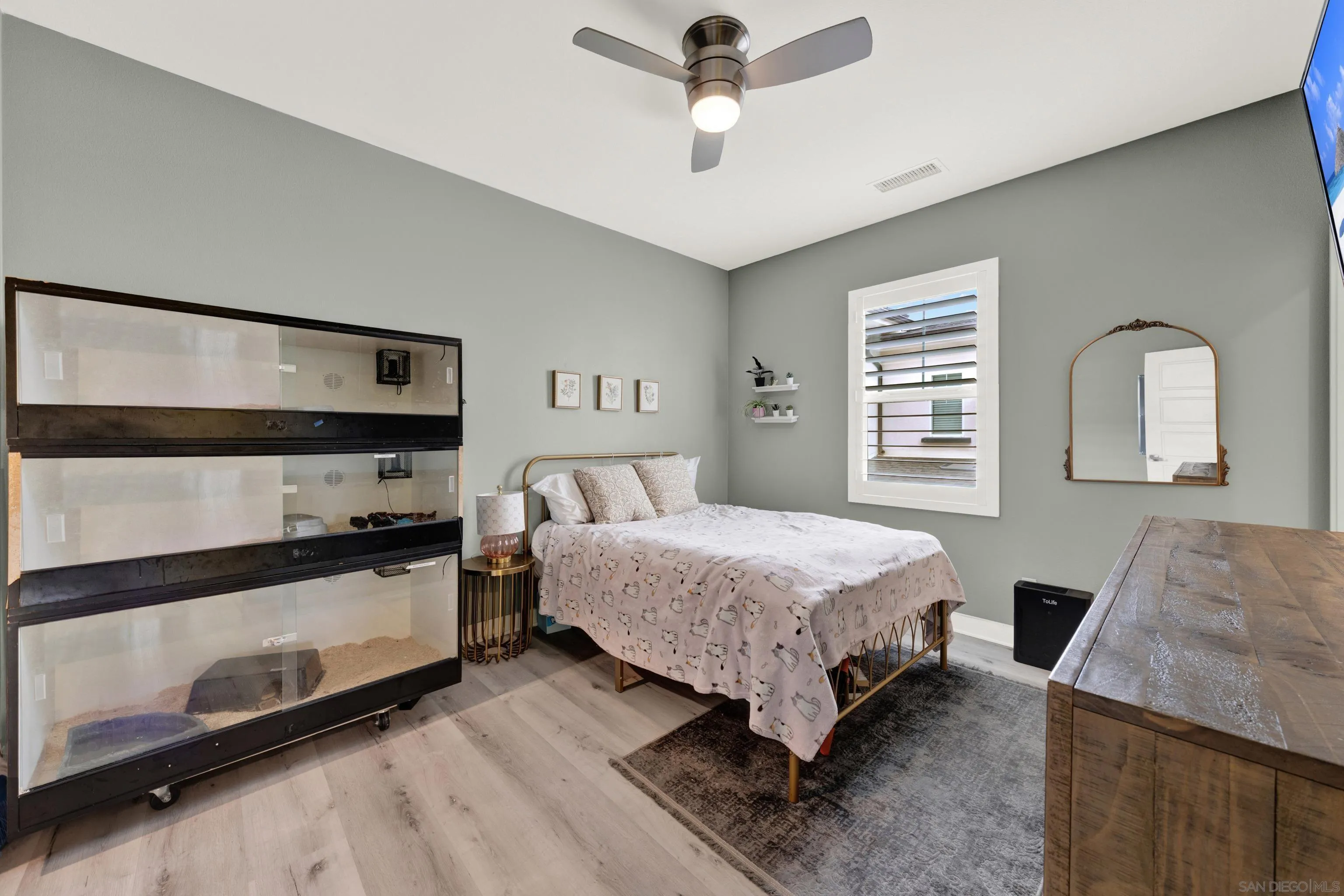 9108 West Bluff Place Santee, CA 92071 - Photo 60 of 72 a bedroom with a bed and a dresser