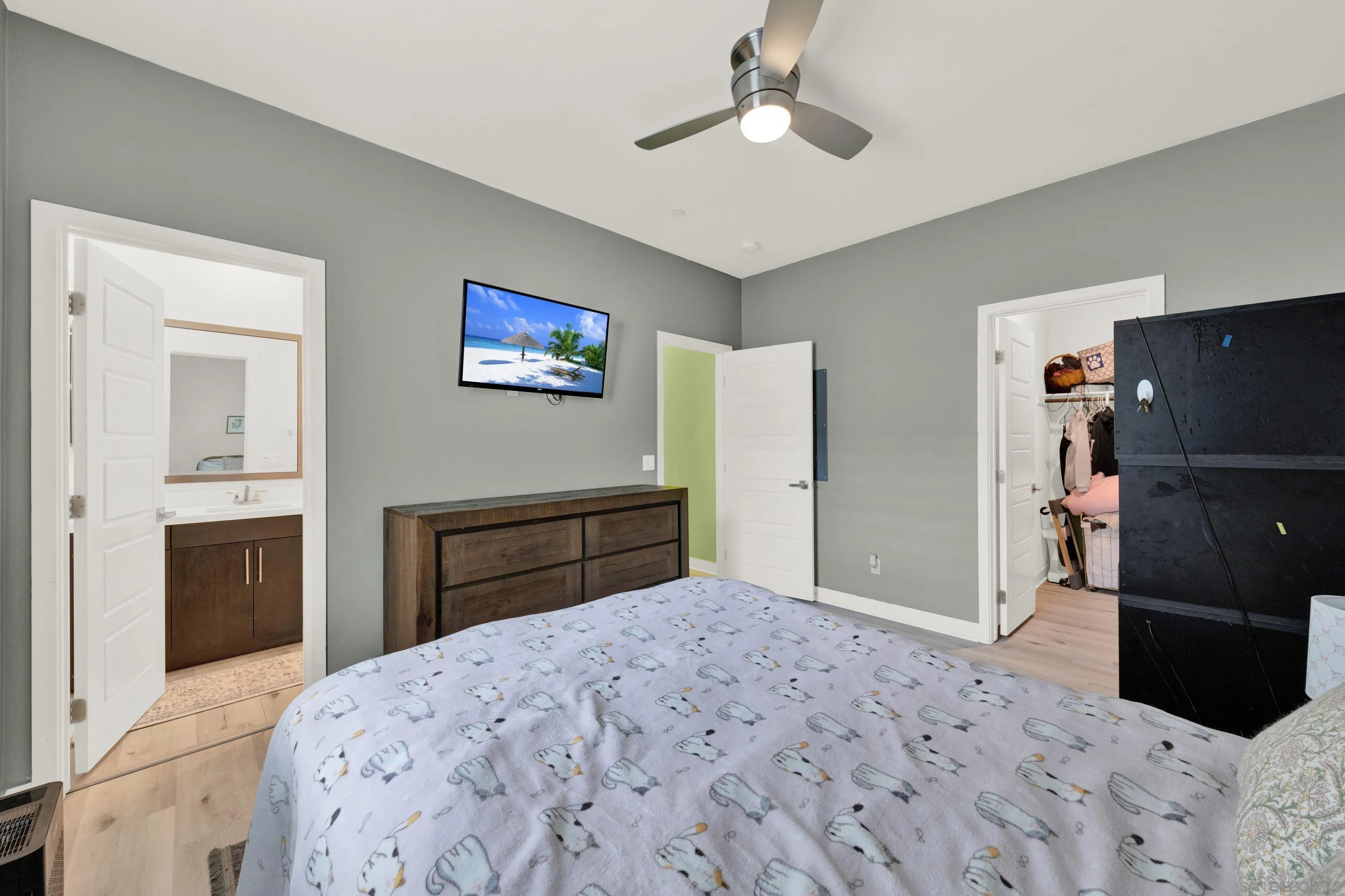 9108 West Bluff Place Santee, CA 92071 - Photo 62 of 72 a bedroom with a bed and a television