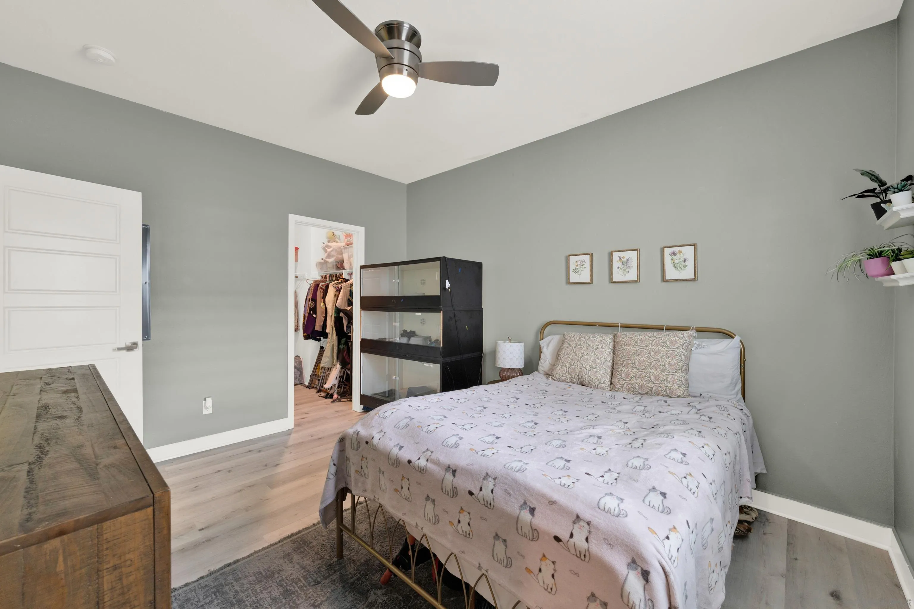 9108 West Bluff Place Santee, CA 92071 - Photo 65 of 72 a bedroom with a bed and a chandelier