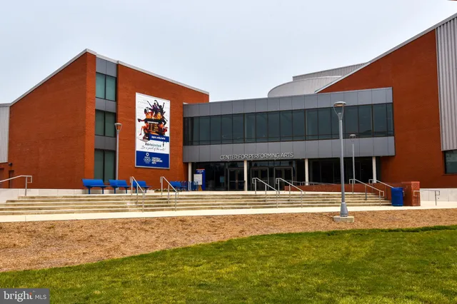 a red sign board with a sign board