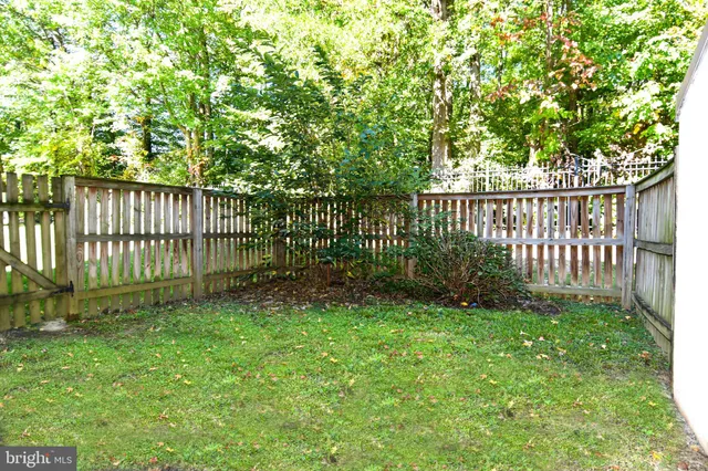 a view of a wooden fence