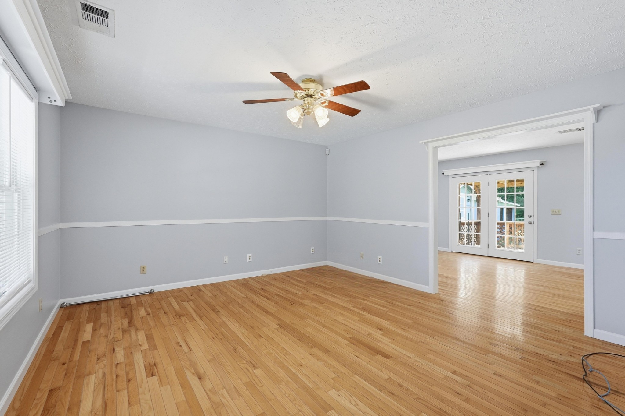 4877 Swafford Road Cookeville, TN 38501 - Photo 27 of 28 wooden floor in an empty room with a window