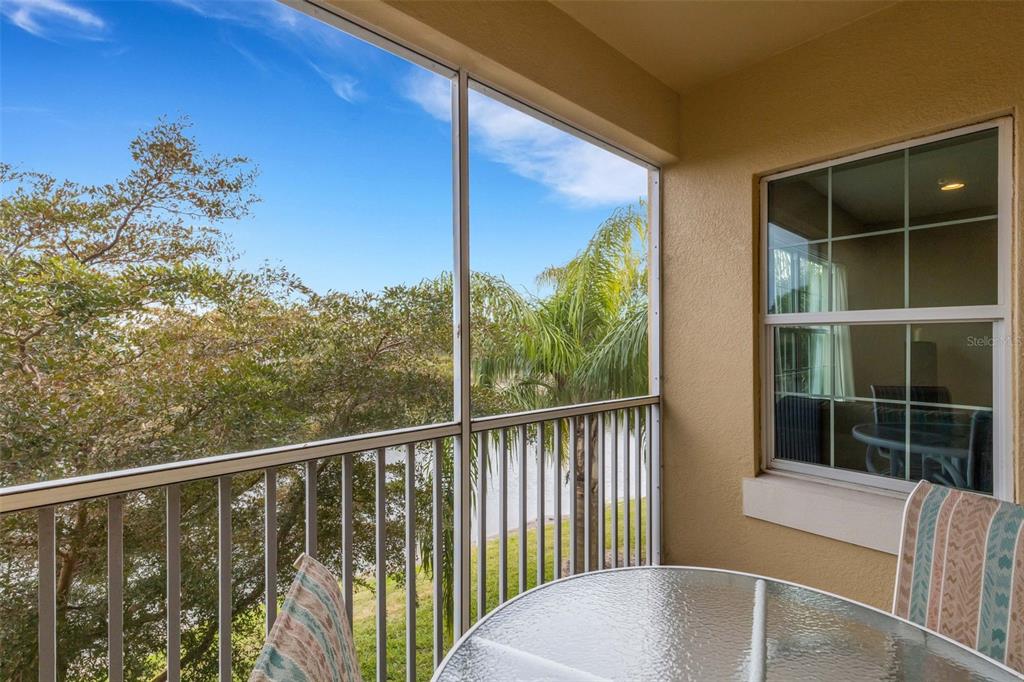 4284 Expedition Way Osprey, FL 34229 - Photo 16 of 40 a view of a balcony with chair