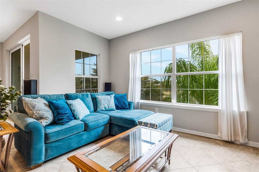 4284 Expedition Way Osprey, FL 34229 - Photo 2 of 40 a living room with furniture and a window