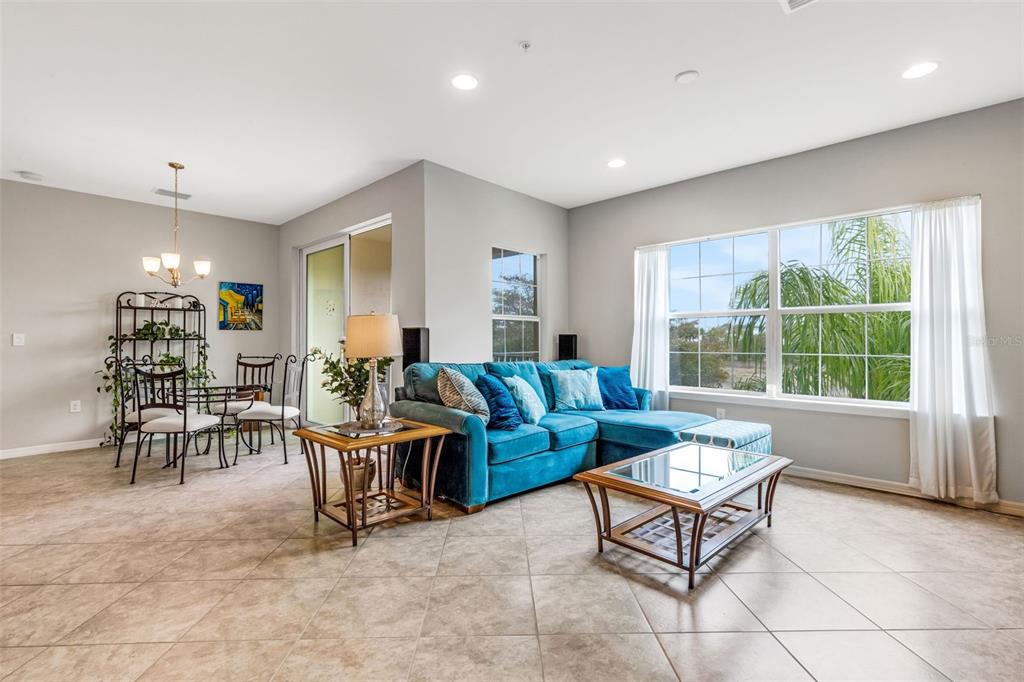 4284 Expedition Way Osprey, FL 34229 - Photo 3 of 40 a living room with furniture and a large window