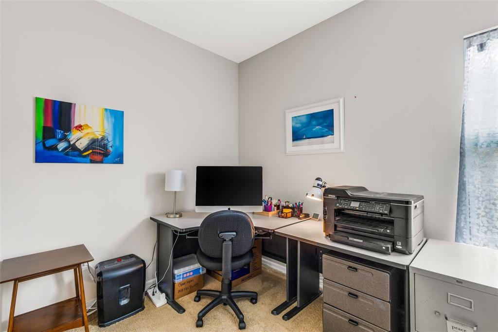 4284 Expedition Way Osprey, FL 34229 - Photo 31 of 40 a view of a workspace with furniture and a workspace