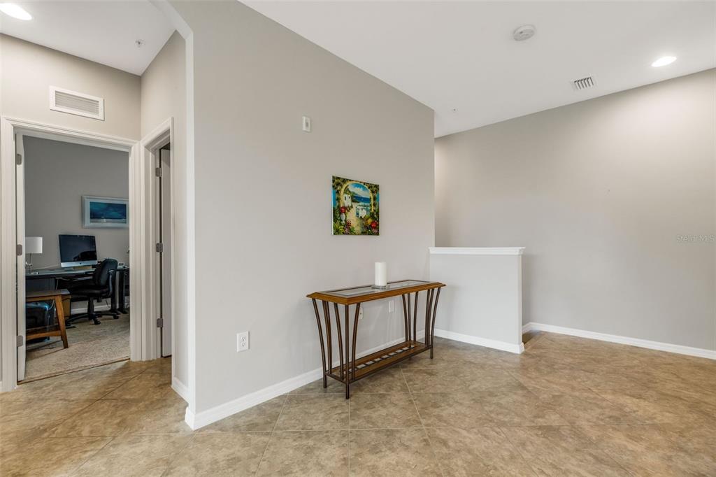 4284 Expedition Way Osprey, FL 34229 - Photo 32 of 40 a living room with furniture