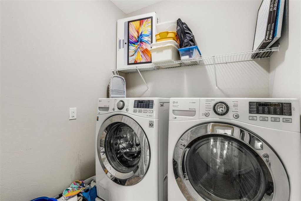 4284 Expedition Way Osprey, FL 34229 - Photo 35 of 40 a utility room with dryer and washer