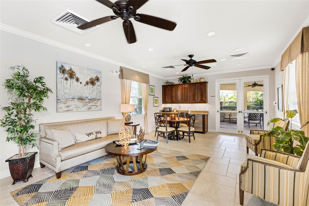 4284 Expedition Way Osprey, FL 34229 - Photo 37 of 40 a living room with furniture and a large window