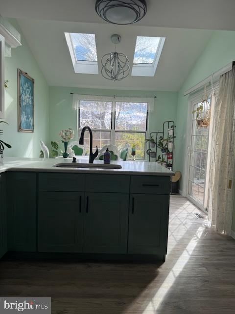 3 Owl Court Marlton, NJ 08053 - Photo 13 of 29 a kitchen with stainless steel appliances a sink dishwasher a refrigerator and a dining table with wooden floor