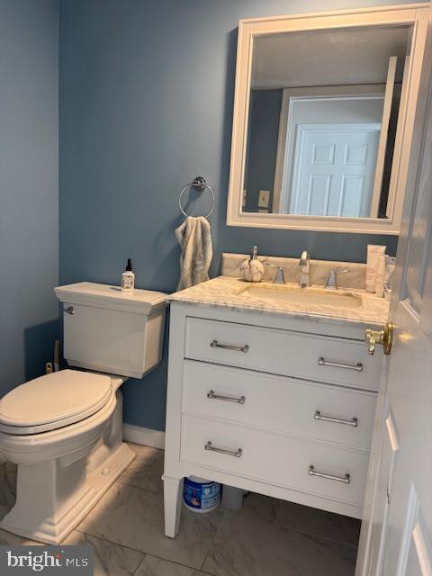 3 Owl Court Marlton, NJ 08053 - Photo 21 of 29 a bathroom with a toilet sink and mirror