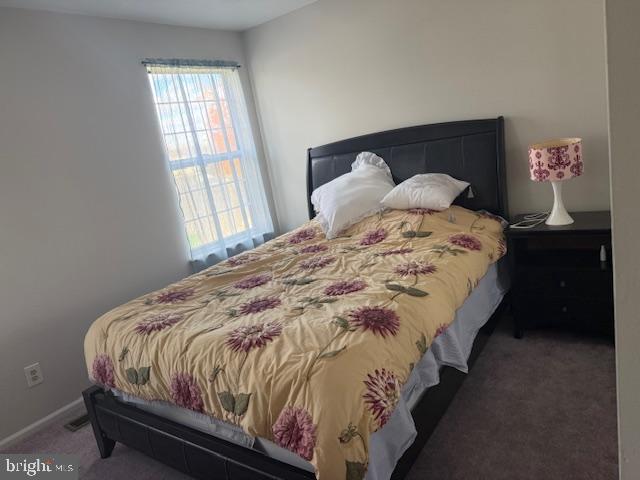 3 Owl Court Marlton, NJ 08053 - Photo 29 of 29 a bed sitting in a bedroom next to a window