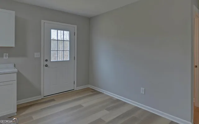 an empty room with windows