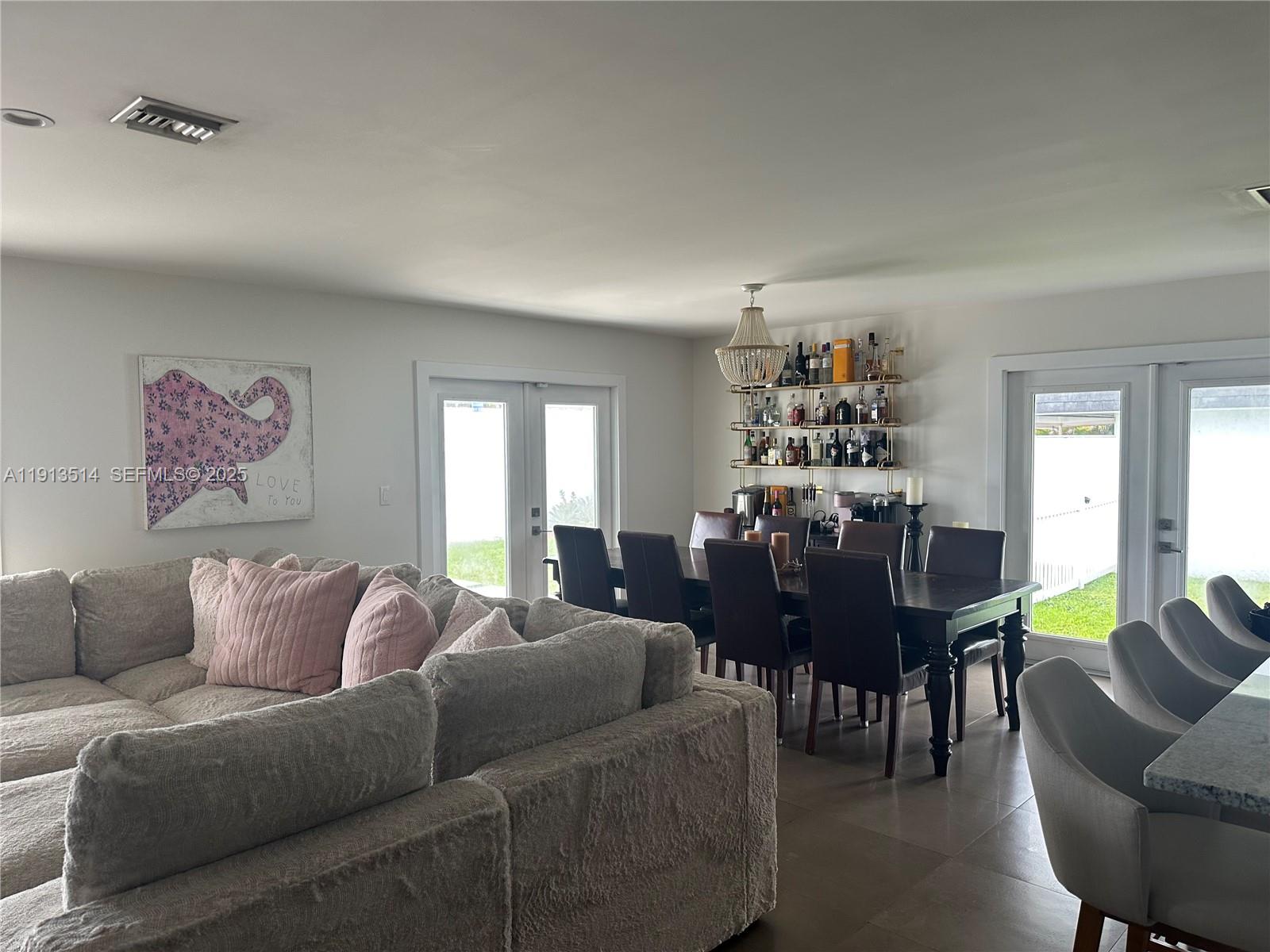 11370 Southwest 113th Terrace Miami, FL 33176 - Photo 13 of 27 a living room with furniture dining area and a window