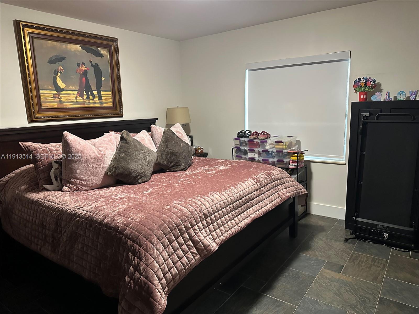 11370 Southwest 113th Terrace Miami, FL 33176 - Photo 15 of 27 a bedroom with bed and wall painting