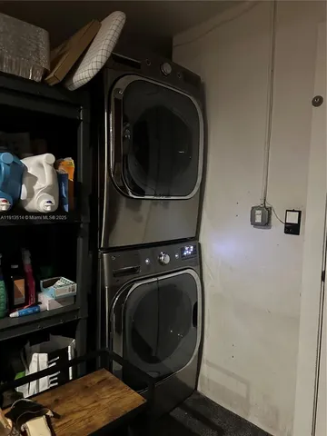 a kitchen with a sink a stove and a refrigerator