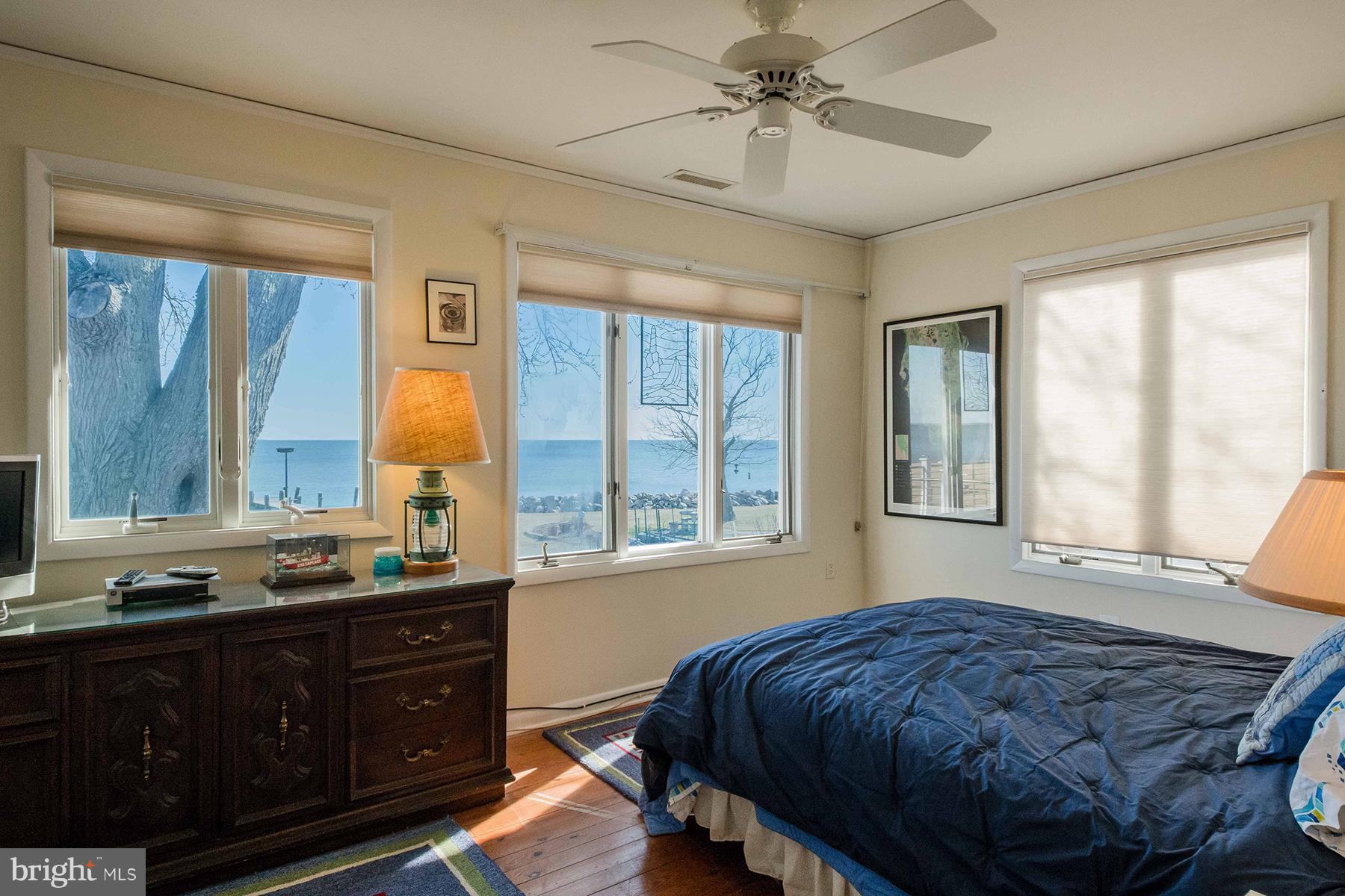 1096 Broadwater Point Road Churchton, MD 20733 - Photo 13 of 22 Master bedroom with panoramic Chesapeake Bay views