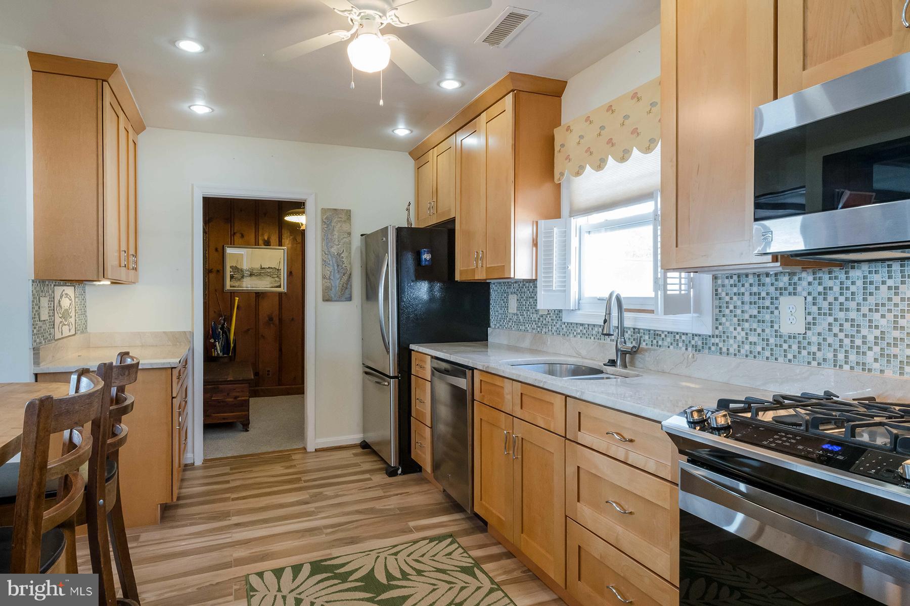 1096 Broadwater Point Road Churchton, MD 20733 - Photo 9 of 22 Remodeled kitchen with granite countertops
