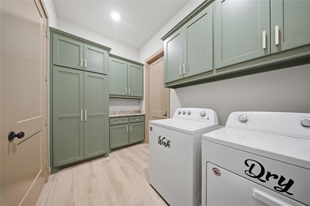 958 Cedar Mills Road Gordonville, TX 76245 - Photo 24 of 40 a utility room with dryer and washer