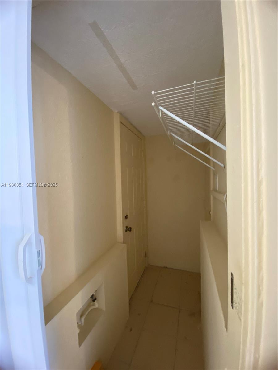 1062 West 42nd Place, Unit 41 Hialeah, FL 33012 - Photo 6 of 6 a bathroom with a shower