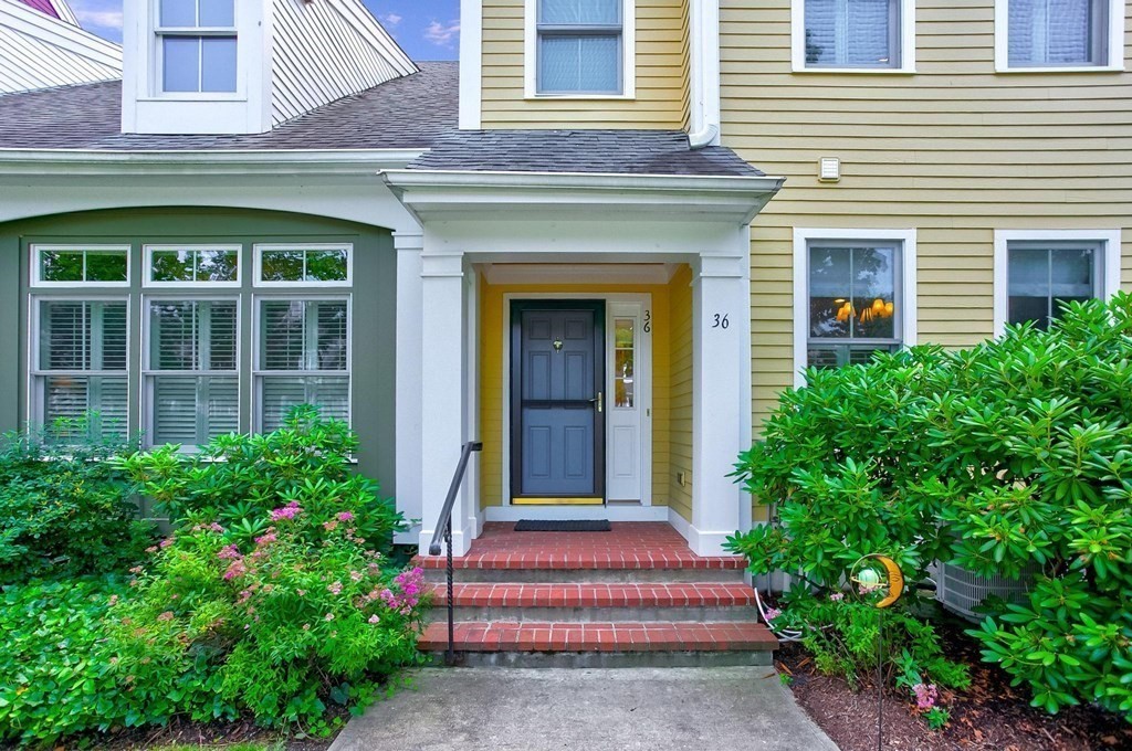 a front view of a house with a porch