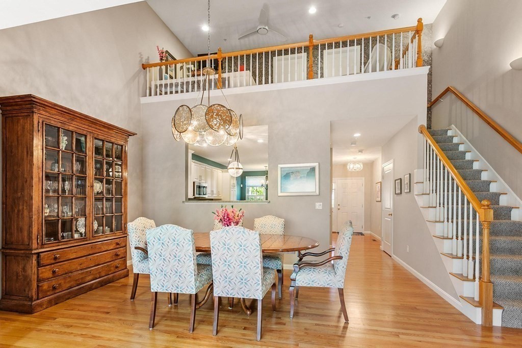 36 Owen Road, Unit 36 Norton, MA 02766 - Photo 12 of 40 a view of a dining room with furniture window and wooden floor