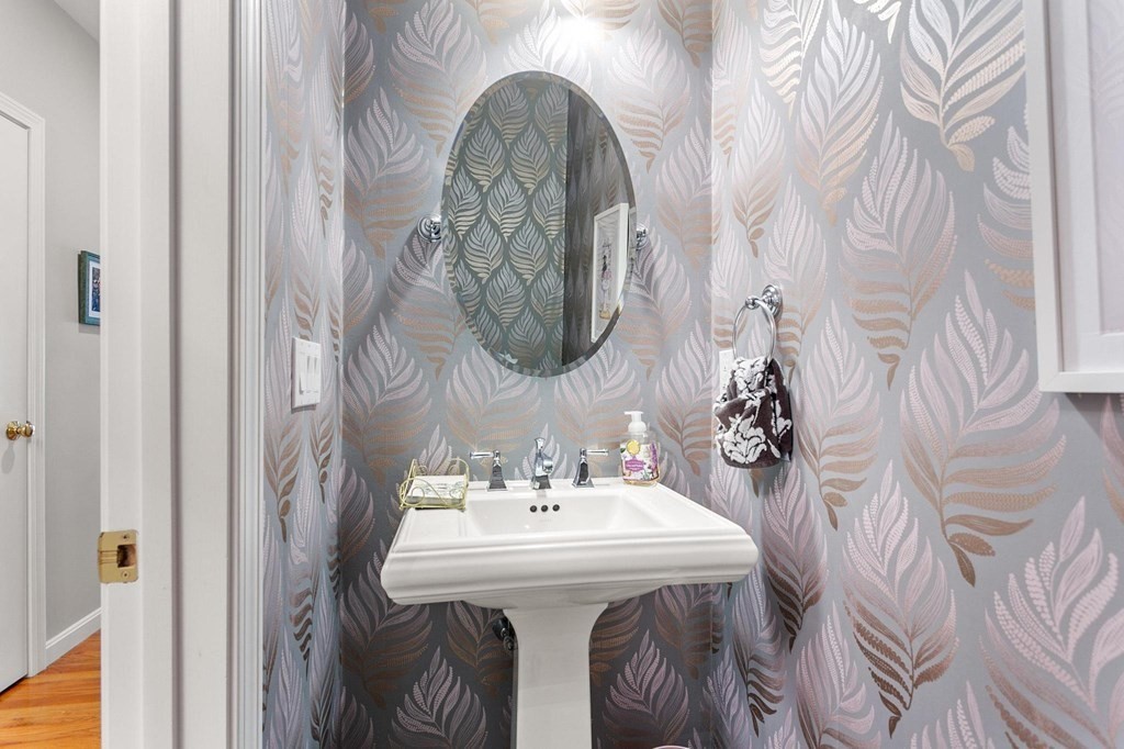 36 Owen Road, Unit 36 Norton, MA 02766 - Photo 16 of 40 a bathroom with a sink and a mirror