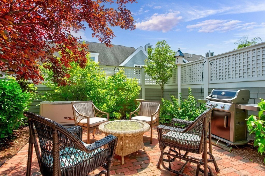 36 Owen Road, Unit 36 Norton, MA 02766 - Photo 26 of 40 a view of a patio in backyard
