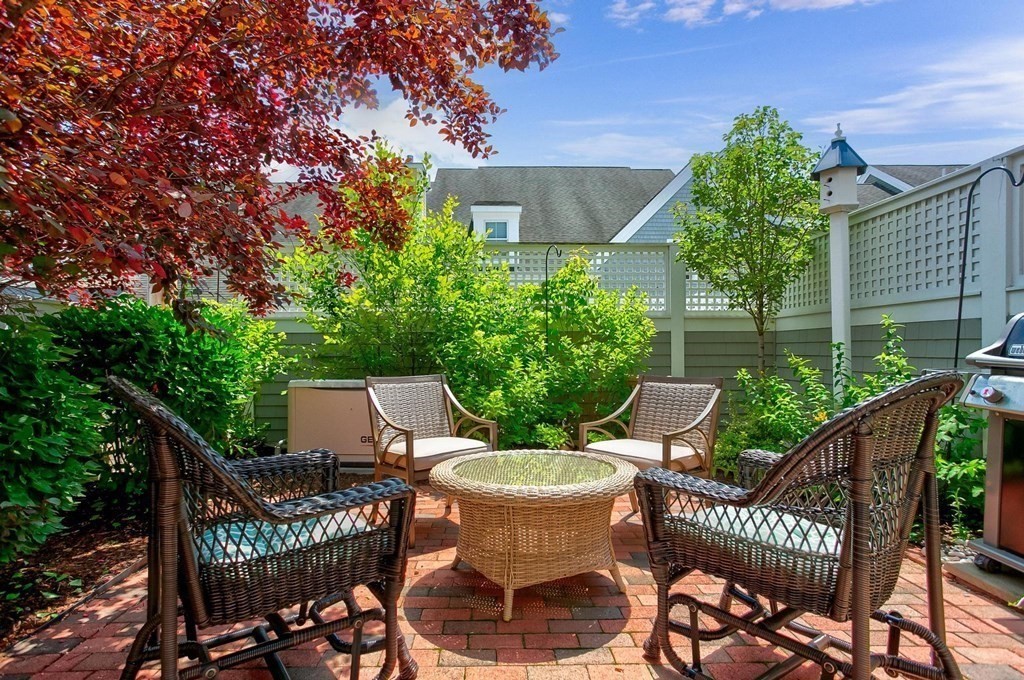 36 Owen Road, Unit 36 Norton, MA 02766 - Photo 28 of 40 a view of a patio in backyard