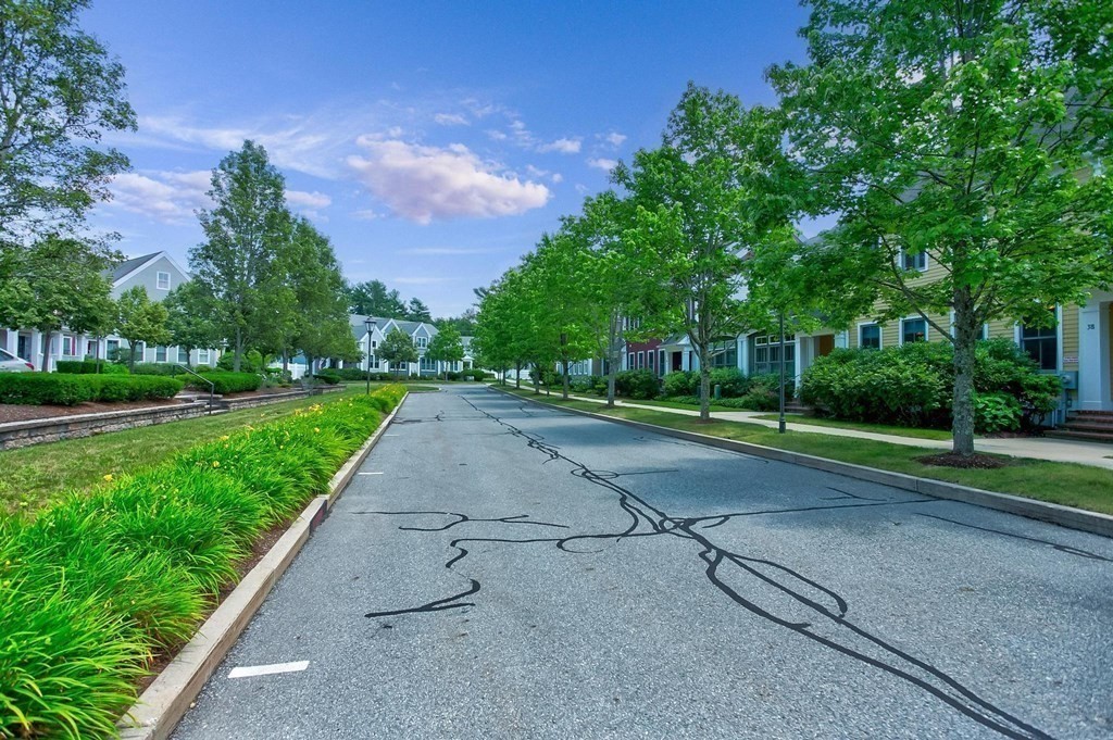 36 Owen Road, Unit 36 Norton, MA 02766 - Photo 32 of 40 a view of a street with a houses in the background