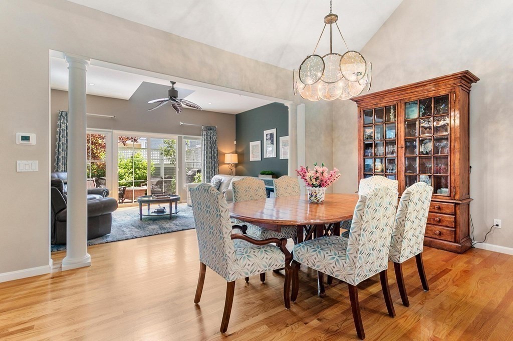 36 Owen Road, Unit 36 Norton, MA 02766 - Photo 10 of 40 a view of a dining room with furniture window and wooden floor
