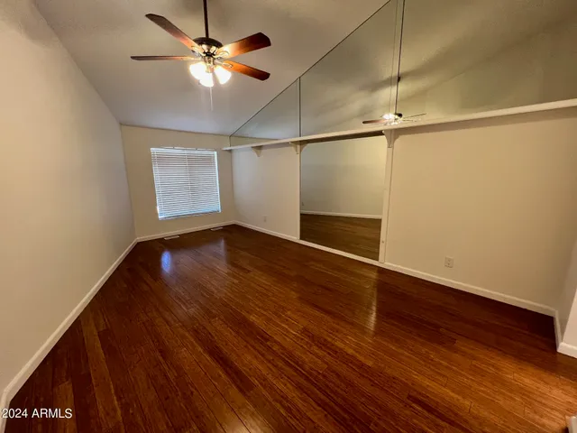 a view of a livingroom with wooden floor