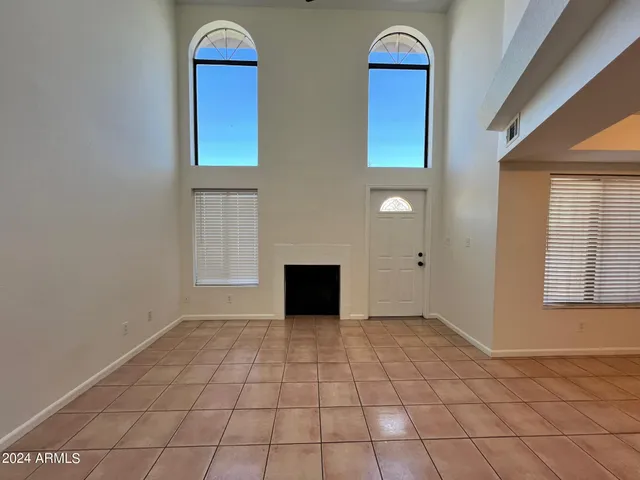 a view of front door and bedroom