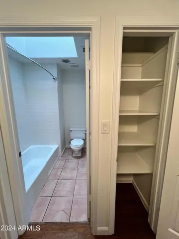 a view of an empty walk in closet