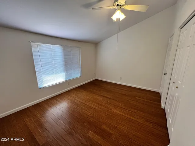 a bathroom with a sink toilet a mirror and a bathtub