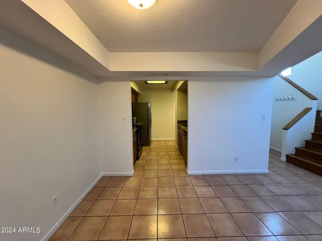 a kitchen with a stove sink and a microwave