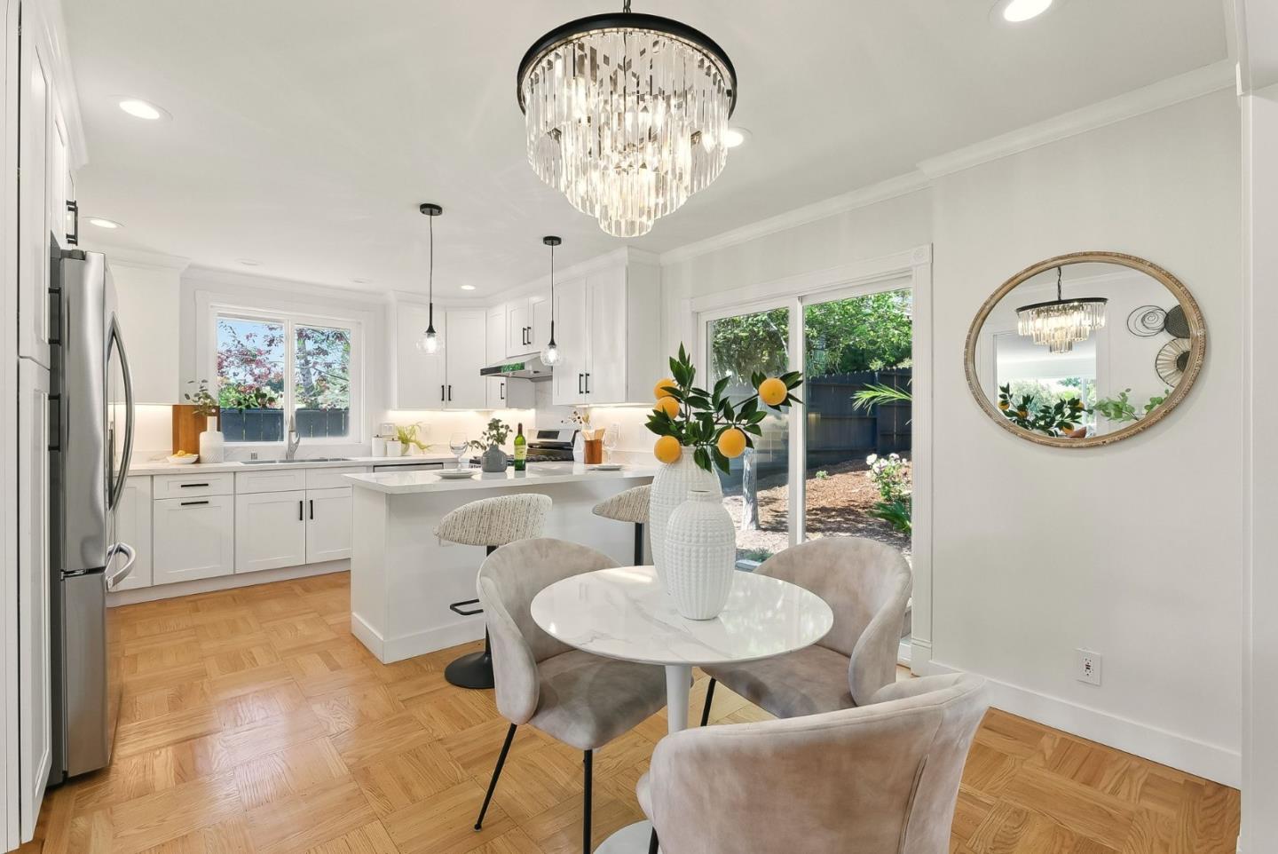 1807 Hunt Drive Burlingame, CA 94010 - Photo 16 of 46 a kitchen with a table and chairs in it