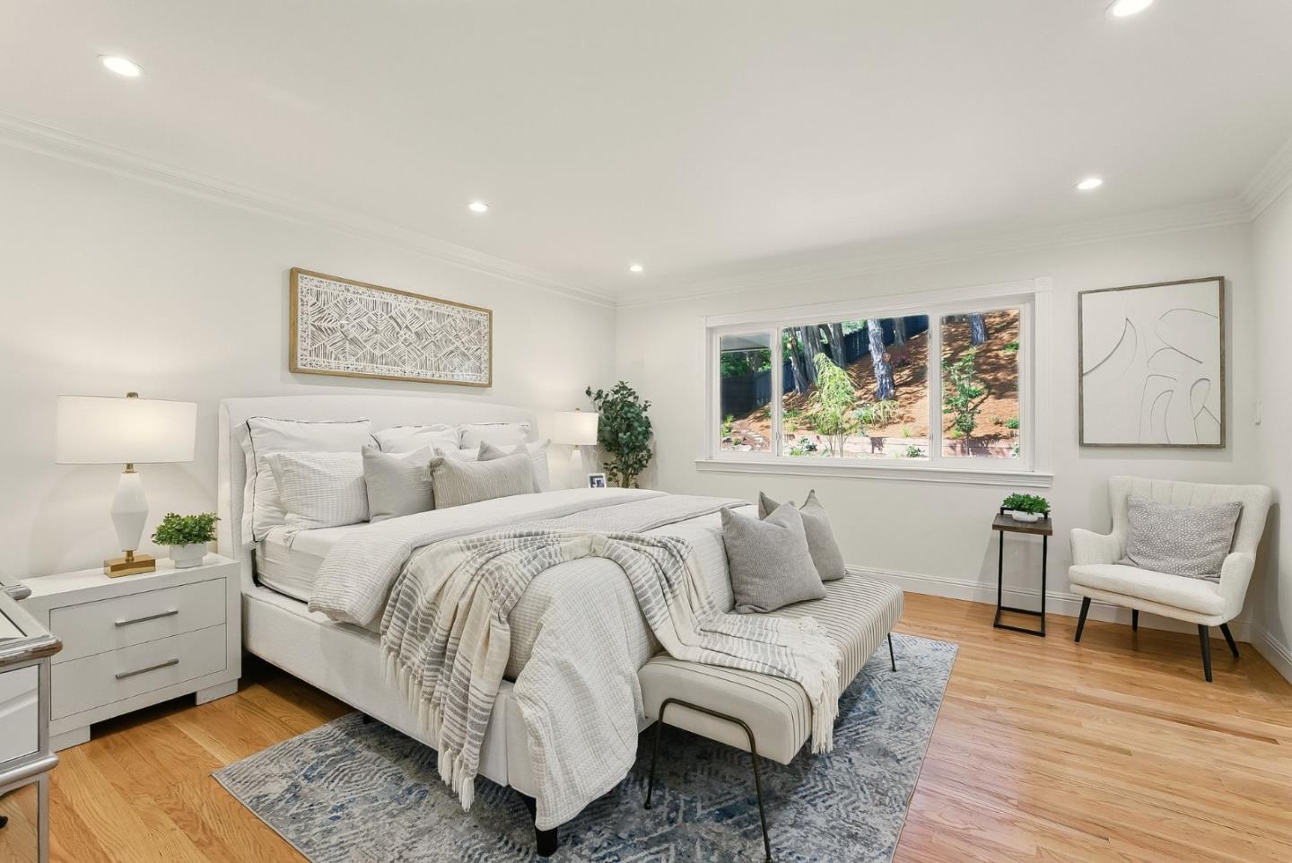 1807 Hunt Drive Burlingame, CA 94010 - Photo 27 of 46 a spacious bedroom with a bed and a couch