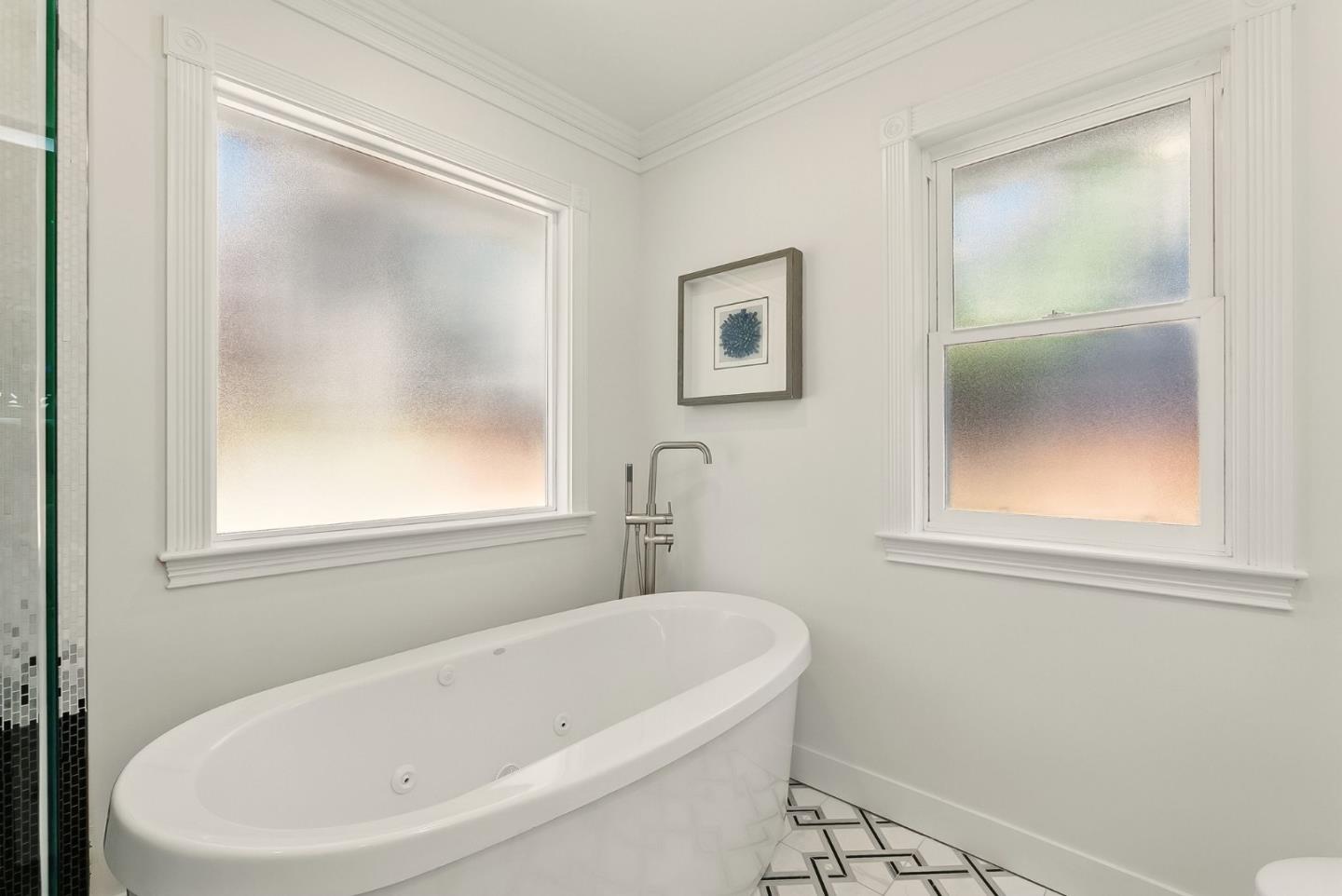 1807 Hunt Drive Burlingame, CA 94010 - Photo 32 of 46 a white bath tub sitting next to a window